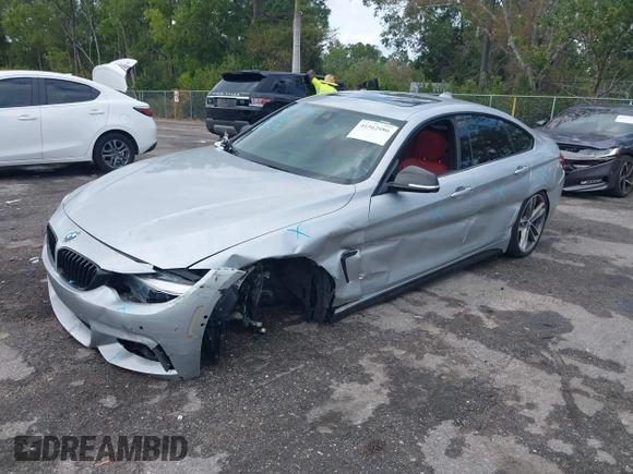 2018 BMW 4 Series 440i with VIN WBA4J5C57JBF07227, listed as a IAAI auction lot 41562986 with 76,316 mi miles and . Bid and sale history available at DreamBid. Image 17.
