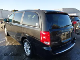 2018 Dodge Grand Caravan SXT with VIN 2C4RDGCG2JR266074, listed as a IAAI auction lot 40545630 with 98,036 mi miles and . Bid and sale history available at DreamBid. Image 3.