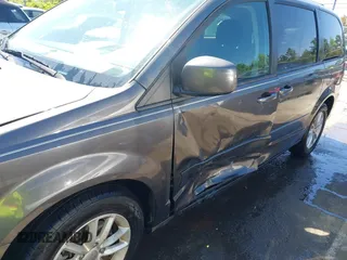 2015 Dodge Grand Caravan SXT with VIN 2C4RDGCG4FR631362, listed as a IAAI auction lot 42027066 with 149,599 mi miles and . Bid and sale history available at DreamBid. Image 6.