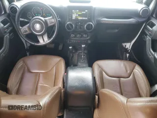 2013 Jeep Wrangler Unlimited Moab with VIN 1C4BJWEG6DL583841, listed as a Copart auction lot 52487915 with 130,369 mi miles and Salvage title. Bid and sale history available at DreamBid. Image 8.