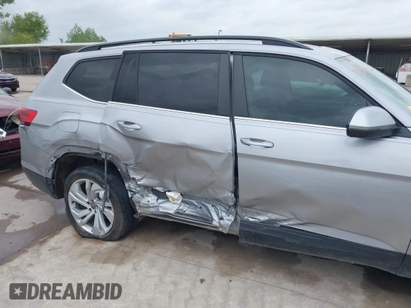 2021 Volkswagen Atlas SE с VIN 1V2JR2CA2MC539992, выставлен на аукционе IAAI как лот 42133933 с пробегом 82 287 миль миль и . История ставок и продаж доступна на DreamBid. Изображение 6.