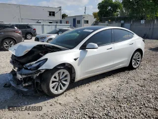 2023 Tesla Model 3 with VIN 5YJ3E1EA6PF510323, listed as a Copart auction lot 52094495 with 115,928 mi miles and Salvage Title. Bid and sale history available at DreamBid. Image 1.