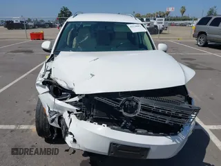 2014 Volkswagen Tiguan SEL with VIN WVGAV3AX9EW512956, listed as a IAAI auction lot 42110002 with 136,034 mi miles and . Bid and sale history available at DreamBid. Image 12.