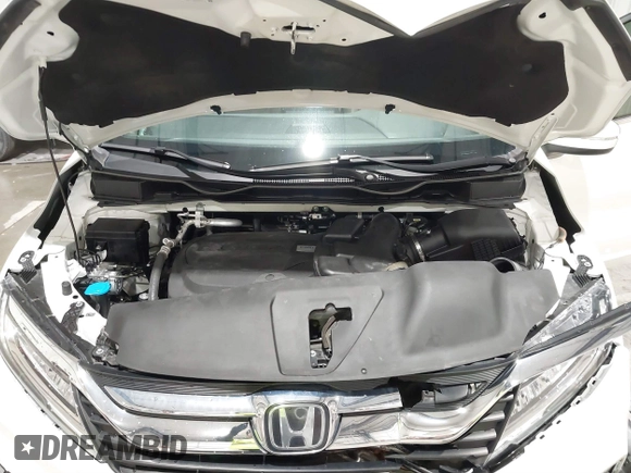 2019 Honda Odyssey Touring with VIN 5FNRL6H83KB051363, listed as a IAAI auction lot 41173587 with 88,512 mi miles. Bid and sale history available at carsss.com. Image 10.