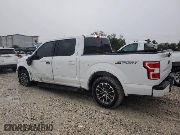 2018 Ford F-150 XL with VIN 1FTEW1CP6JKD50225, listed as a Copart auction lot 59179605 with 105,602 mi miles and Salvage title. Bid and sale history available at DreamBid. Image 2.