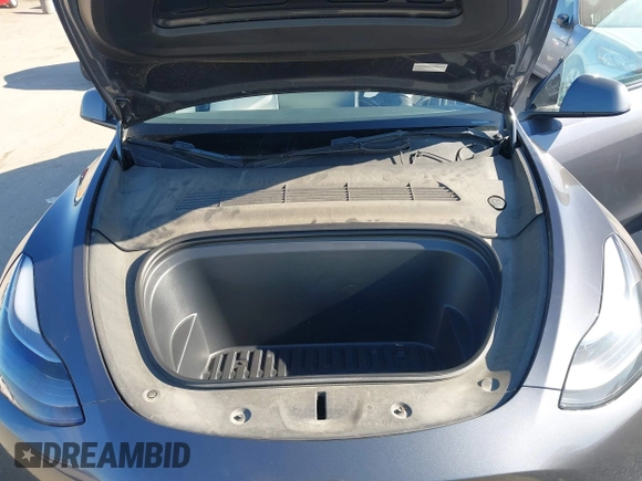 2022 Tesla Model Y Performance z VIN 7SAYGDEF2NF490794, wystawiony jako IAAI lot #42218742 z przebiegiem 41 402 mil mil oraz . Historia ofert i sprzedaży dostępna na DreamBid. Obrazek 10.