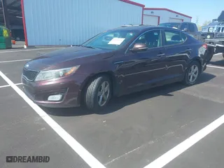 2014 Kia Optima LX with VIN 5XXGM4A77EG310738, listed as a IAAI auction lot 41990314 with 1 mi miles. Bid and sale history available at carsss.com. Image 2.