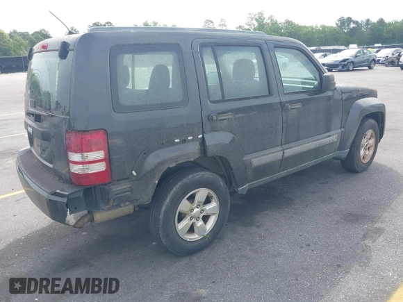 2011 Jeep Liberty Sport with VIN 1J4PP2GK8BW580217, listed as a IAAI auction lot 42046477 with 240,189 mi miles. Bid and sale history available at carsss.com. Image 4.