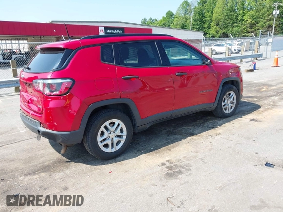 2018 Jeep Compass Sport with VIN 3C4NJCABXJT308768, listed as a IAAI auction lot 42420499 with 84,285 mi miles and . Bid and sale history available at DreamBid. Image 4.