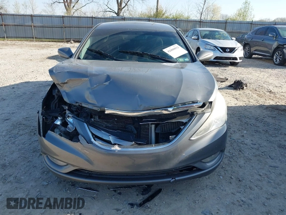 2013 Hyundai Sonata Limited with VIN 5NPEC4AB1DH585765, listed as a IAAI auction lot 42000032 with 179,490 mi miles and . Bid and sale history available at DreamBid. Image 12.