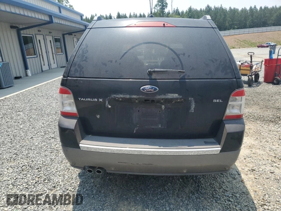 2008 Ford Taurus X SEL with VIN 1FMDK02W08GA29428, listed as a Copart auction lot 58902675 with 256,008 mi miles and Salvage title. Bid and sale history available at DreamBid. Image 6.