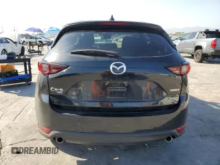 2021 Mazda CX-5 Touring with VIN JM3KFBCM8M0495899, listed as a Copart auction lot 51049235 with 31,164 mi miles and Salvage Title. Bid and sale history available at carsss.com. Image 6.