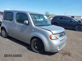 2011 Nissan Cube S z VIN JN8AZ2KR1BT205110, wystawiony jako IAAI lot #42152109 z przebiegiem 92 493 mil mil oraz . Historia ofert i sprzedaży dostępna na DreamBid. Obrazek 1.
