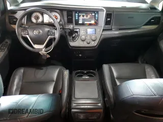 2017 Toyota Sienna SE with VIN 5TDXZ3DC7HS785250, listed as a Copart auction lot 57009695 with 79,691 mi miles and Salvage title. Bid and sale history available at DreamBid. Image 8.