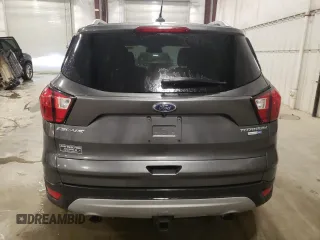 2019 Ford Escape Titanium z VIN 1FMCU9J93KUC54523, wystawiony jako Copart lot #53613665 z przebiegiem 140 895 mil mil oraz Szkoda całkowita • Salvage title. Historia ofert i sprzedaży dostępna na DreamBid. Obrazek 6.