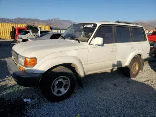 1995 Toyota Land Cruiser z VIN JT3DJ81W4S0108306, wystawiony jako Copart lot #80397774 z przebiegiem 190 833 mil mil oraz Czysty tytuł • Clean title. Historia ofert i sprzedaży dostępna na DreamBid. Obrazek 1.