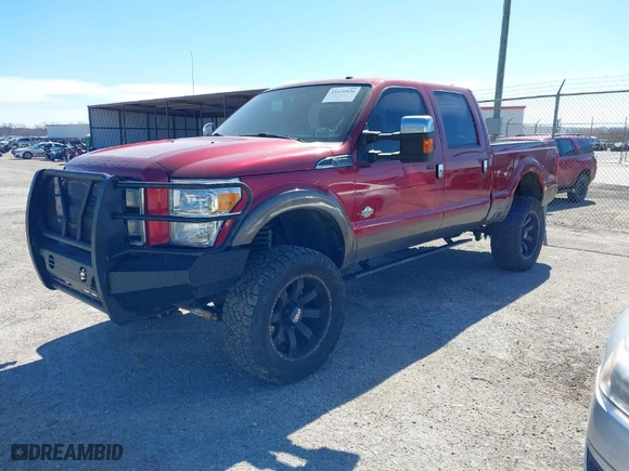 2015 Ford Super Duty F-250 SRW Lariat with VIN 1FT7W2BTXFED39893, listed as a IAAI auction lot 41620936 with 153,814 mi miles. Bid and sale history available at carsss.com. Image 2.