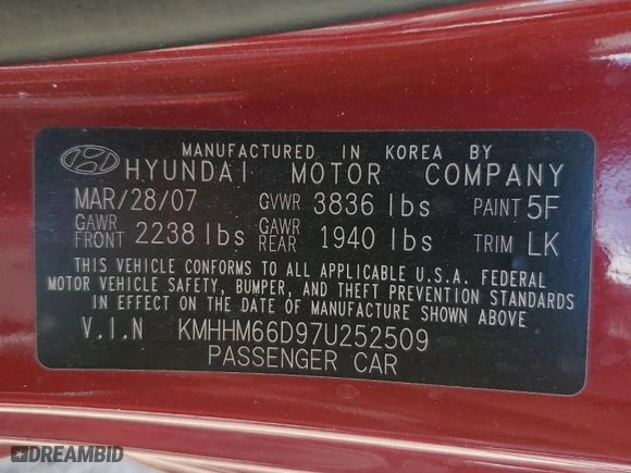 2007 Hyundai Tiburon GS with VIN KMHHM66D97U252509, listed as a Copart auction lot 69622644 with 105,908 mi miles and Clean Title. Bid and sale history available at carsss.com. Image 12.