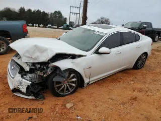 2015 Jaguar XF I4 T Premium with VIN SAJWA0FS0FPU48322, listed as a Copart auction lot 43970895 with 96,155 mi miles and Salvage Title. Bid and sale history available at carsss.com. Image 1.