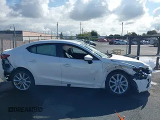 2017 Mazda 3 Touring with VIN 3MZBN1V72HM121902, listed as a IAAI auction lot 39193644 with 40,113 mi miles and . Bid and sale history available at DreamBid. Image 12.