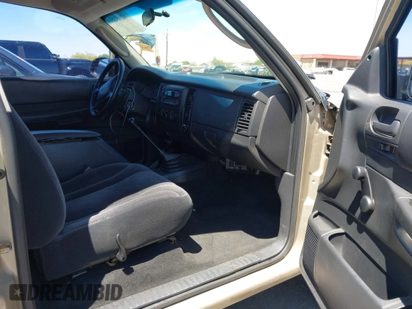 2002 Dodge Dakota with VIN 1B7FL16X72S642881, listed as a IAAI auction lot 42153560 with 220,917 mi miles and . Bid and sale history available at carsss.com. Image 5.