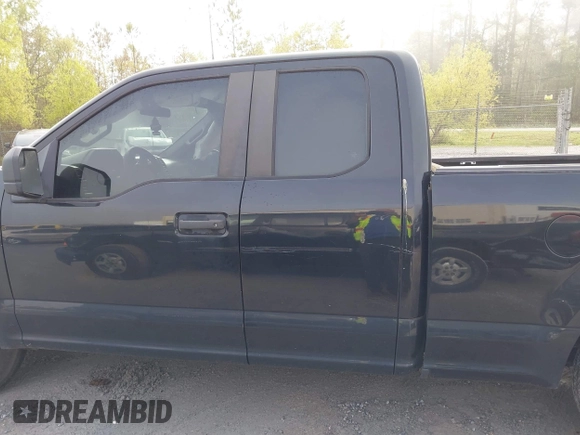 2015 Ford F-150 XL with VIN 1FTEX1CF2FKD12874, listed as a IAAI auction lot 41860610 with 242,215 mi miles. Bid and sale history available at carsss.com. Image 15.