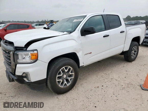 2022 GMC Canyon 4WD AT4 z VIN 1GTG6FEN2N1210072, wystawiony jako Copart lot #57084565 z przebiegiem 64 897 mil mil oraz Szkoda całkowita • Salvage title. Historia ofert i sprzedaży dostępna na DreamBid. Obrazek 1.