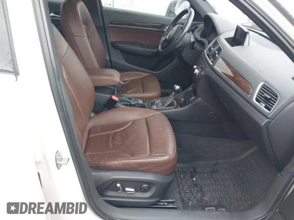 2016 Audi Q3 Premium Plus with VIN WA1BFCFS0GR009654, listed as a IAAI auction lot 42141372 with 138,992 mi miles. Bid and sale history available at carsss.com. Image 5.