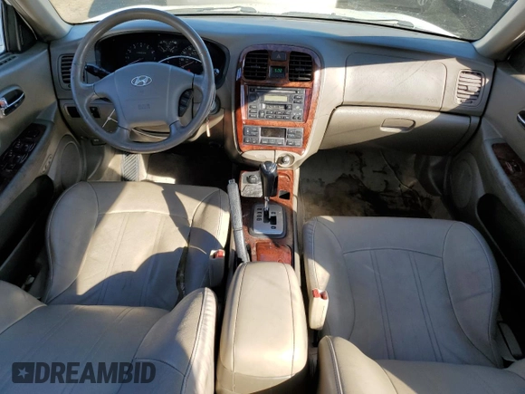 2004 Hyundai Sonata GLS with VIN KMHWF35HX4A975027, listed as a Copart auction lot 82652354 with 148,296 mi miles and Salvage Title. Bid and sale history available at carsss.com. Image 8.