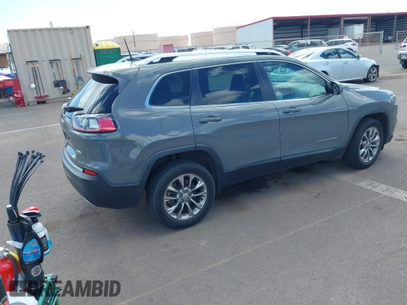2021 Jeep Cherokee Latitude Lux with VIN 1C4PJLMX4MD158909, listed as a IAAI auction lot 41709423 with 28,368 mi miles. Bid and sale history available at carsss.com. Image 4.