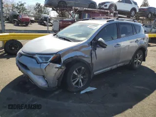 2018 Toyota RAV4 XLE with VIN JTMRFREV6JD244065, listed as a Copart auction lot 49099265 with 121,698 mi miles and Salvage Title. Bid and sale history available at carsss.com. Image 1.