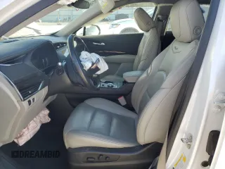 2022 Cadillac XT4 FWD Premium Luxury with VIN 1GYFZCR45NF100049, listed as a Copart auction lot 87232634 with 62,391 mi miles and Salvage title. Bid and sale history available at DreamBid. Image 7.