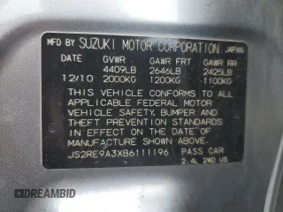 2011 Suzuki Kizashi SE z VIN JS2RE9A3XB6111196, wystawiony jako Copart lot #48076635 z przebiegiem 113 569 mil mil oraz Szkody całkowita. Historia ofert i sprzedaży dostępna na DreamBid. Obrazek 12.