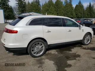 2014 Lincoln MKT EcoBoost with VIN 2LMHJ5ATXEBL58623, listed as a Copart auction lot 48222015 with 255,495 mi miles and Clean Title. Bid and sale history available at DreamBid. Image 3.