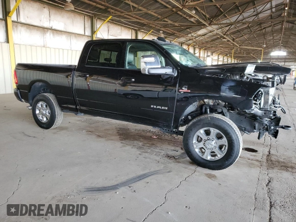 2023 Ram 2500 Laramie with VIN 3C6UR5FL4PG580565, listed as a Copart auction lot 42385155 with 13,939 mi miles and Salvage Title. Bid and sale history available at carsss.com. Image 4.