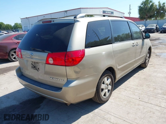 2010 Toyota Sienna XLE with VIN 5TDYK4CC5AS292110, listed as a IAAI auction lot 42055505 with 107,390 mi miles. Bid and sale history available at carsss.com. Image 4.