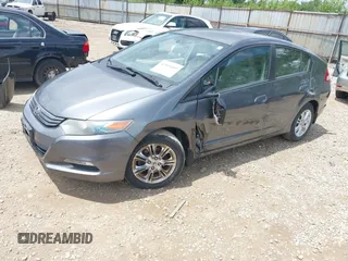 2010 Honda Insight EX with VIN JHMZE2H71AS008487, listed as a IAAI auction lot 42533409 with 95,765 mi miles and . Bid and sale history available at DreamBid. Image 2.