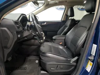 2020 Ford Escape Titanium z VIN 1FMCU9J98LUA93393, wystawiony jako Copart lot #65366925 z przebiegiem 74 750 mil mil oraz Czysty tytuł • Clean title. Historia ofert i sprzedaży dostępna na DreamBid. Obrazek 7.