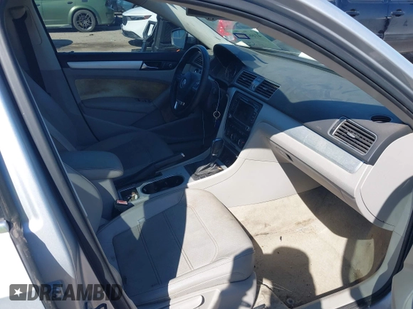 2013 Volkswagen Passat SE w/Sunroof with VIN 1VWBH7A34DC003147, listed as a IAAI auction lot 41662970 with 153,897 mi miles. Bid and sale history available at carsss.com. Image 5.