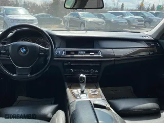 2012 BMW 7 Series 740Li with VIN WBAKB4C55CC576166, listed as a Copart auction lot 52448115 with 154,949 mi miles and Clean Title. Bid and sale history available at carsss.com. Image 9.