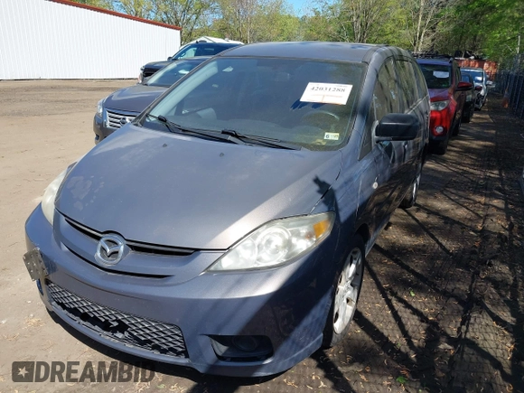2007 Mazda 5 Touring with VIN JM1CR293870159225, listed as a IAAI auction lot 42031288 with 133,416 mi miles and . Bid and sale history available at carsss.com. Image 2.