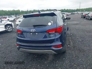 2017 Hyundai Santa Fe 2.4L z VIN 5XYZU3LB7HG418300, wystawiony jako IAAI lot #42369329 z przebiegiem 126 326 mil mil oraz . Historia ofert i sprzedaży dostępna na DreamBid. Obrazek 16.