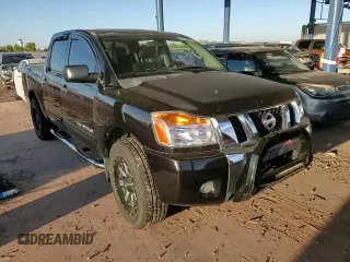 2012 Nissan Titan SV with VIN 1N6BA0ED5CN302776, listed as a Copart auction lot 55096625 with 128,484 mi miles and Salvage title. Bid and sale history available at DreamBid. Image 13.
