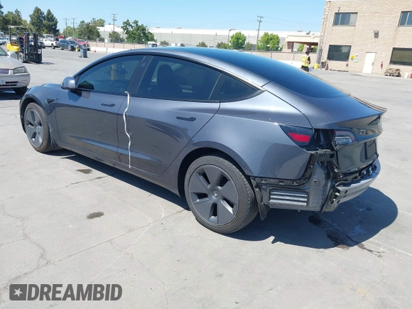 2023 Tesla Model 3 with VIN 5YJ3E1EAXPF405588, listed as a IAAI auction lot 42348952 with 30,788 mi miles and . Bid and sale history available at DreamBid. Image 3.
