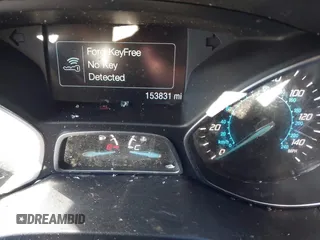 2014 Ford Escape Titanium with VIN 1FMCU9J98EUA77116, listed as a IAAI auction lot 41260418 with 153,831 mi miles. Bid and sale history available at carsss.com. Image 7.