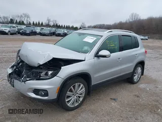 2016 Volkswagen Tiguan SEL z VIN WVGBV7AX3GW594729, wystawiony jako IAAI lot #41233805 z przebiegiem 92 997 mil mil oraz . Historia ofert i sprzedaży dostępna na DreamBid. Obrazek 18.