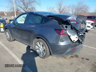 2020 Tesla Model Y Long Range with VIN 5YJYGDEE4LF030103, listed as a IAAI auction lot 41328929 with 64,896 mi miles and . Bid and sale history available at DreamBid. Image 3.