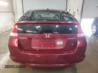 2010 Honda Insight LX with VIN JHMZE2H52AS034613, listed as a Copart auction lot 52701795 with 232,541 mi miles and Salvage Title. Bid and sale history available at DreamBid. Image 6.