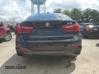 2015 BMW X6 xDrive35i z VIN 5UXKU2C58F0N77513, wystawiony jako Copart lot #55859345 z przebiegiem 82 560 mil mil oraz Szkoda całkowita • Salvage title. Historia ofert i sprzedaży dostępna na DreamBid. Obrazek 6.