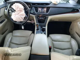 2017 Cadillac XT5 Luxury FWD with VIN 1GYKNBRS0HZ196145, listed as a Copart auction lot 83430344 with 143,012 mi miles and Salvage title. Bid and sale history available at DreamBid. Image 8.